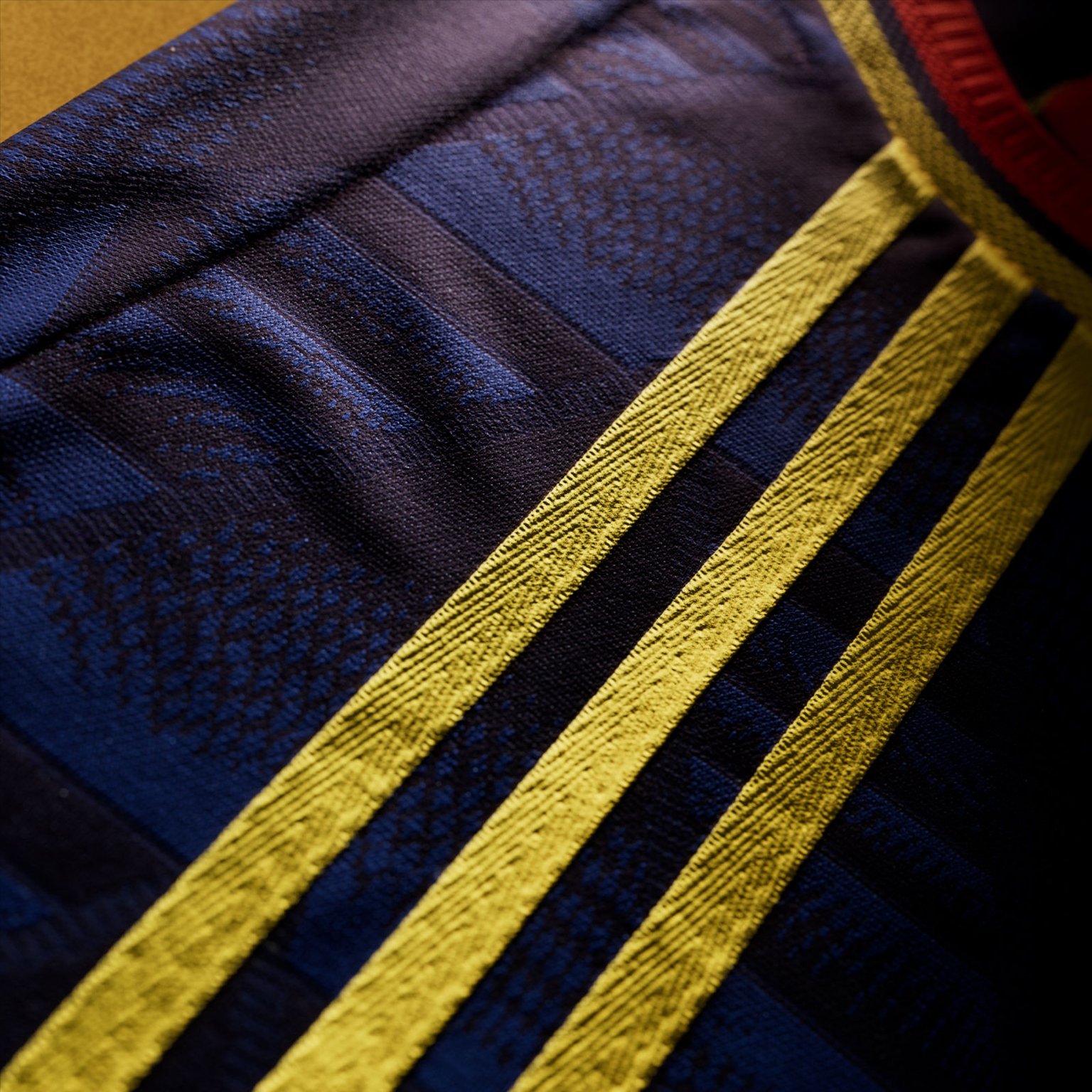 Visual featuring the new Arsenal 26/27 Away kit stripes